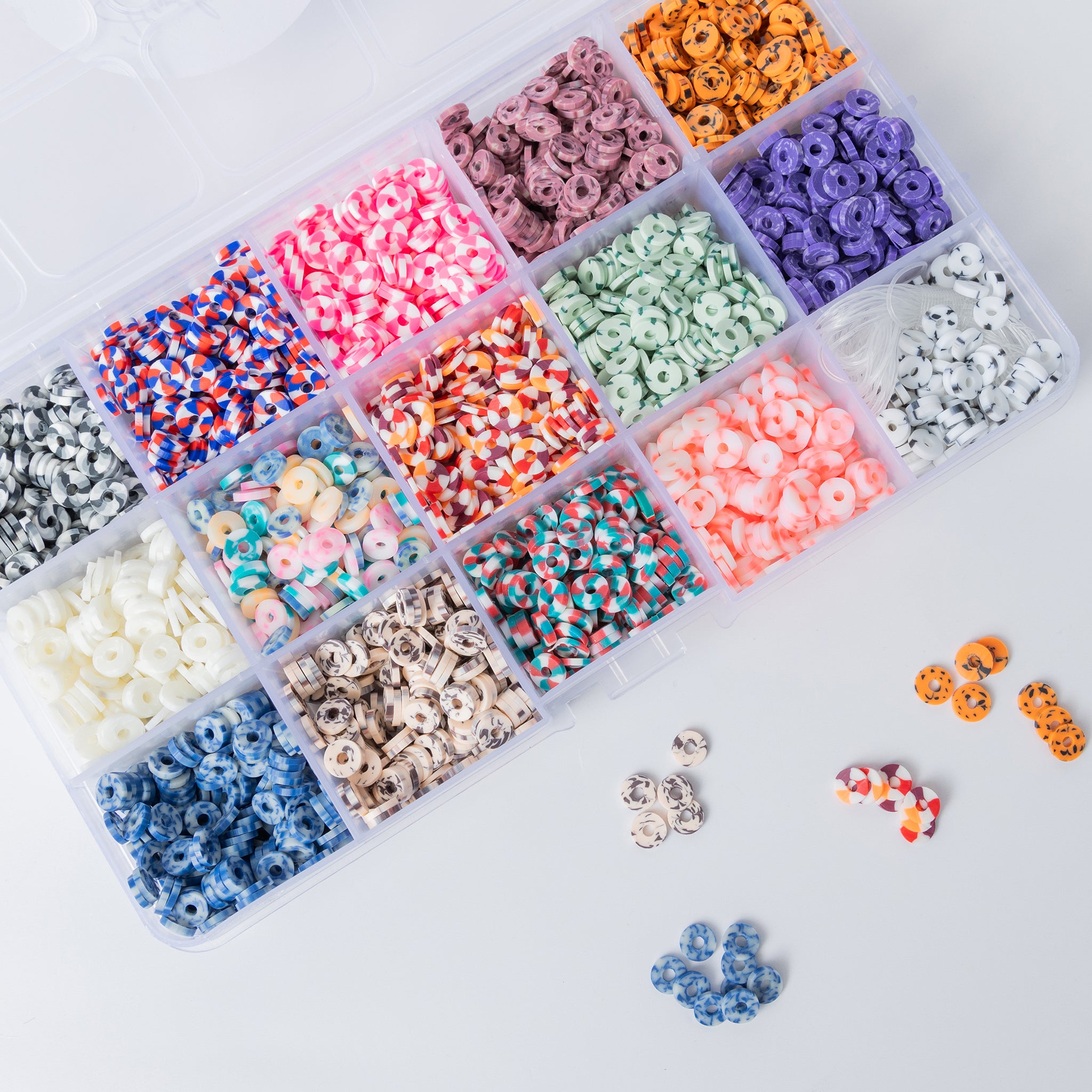 thumbnail image 2 of Mad River Dubbing Co. 6mm Speckled UV Steelie Beads – 10 Color Assortment Box 2 of 3