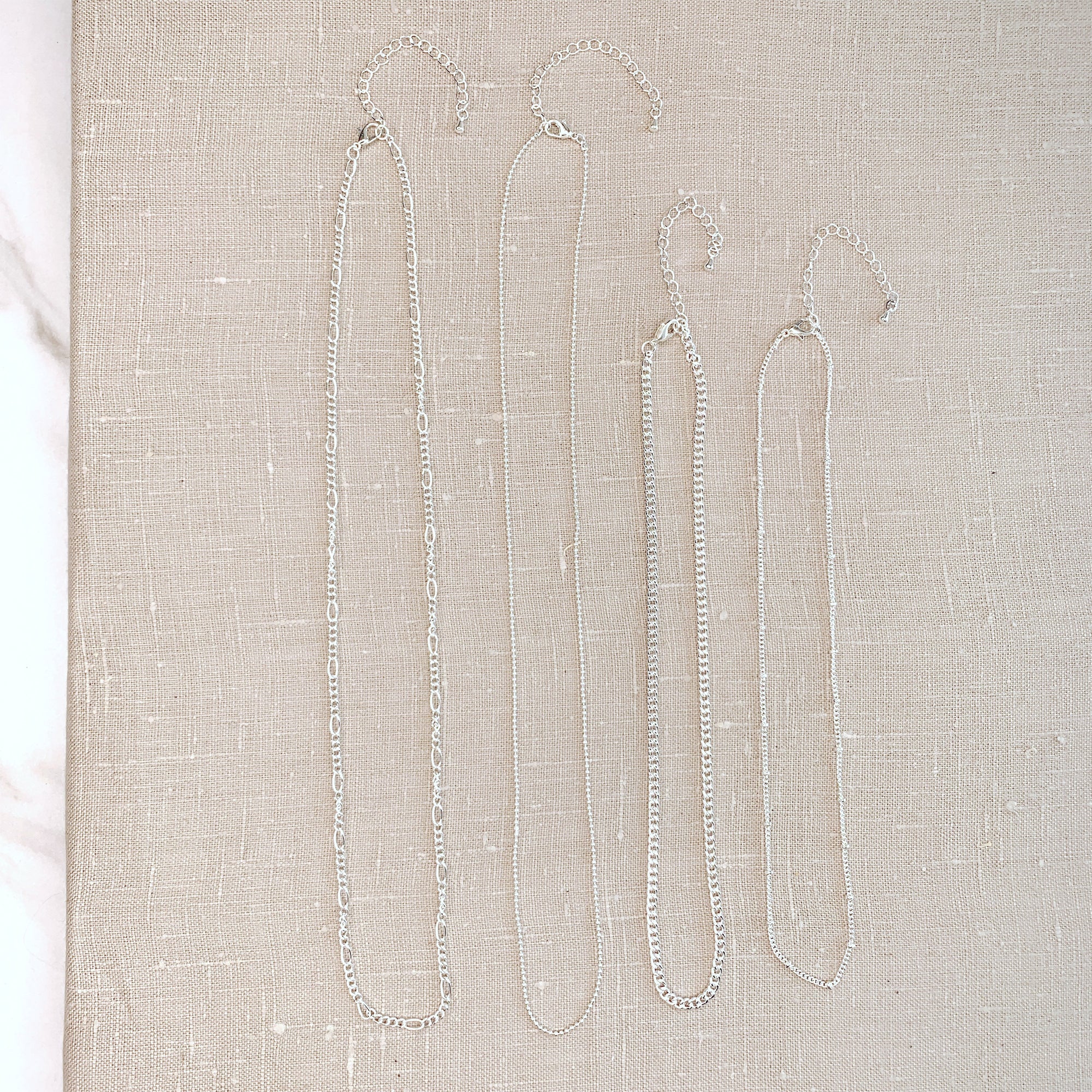 Silver Multi Chain Necklaces 4pc Set